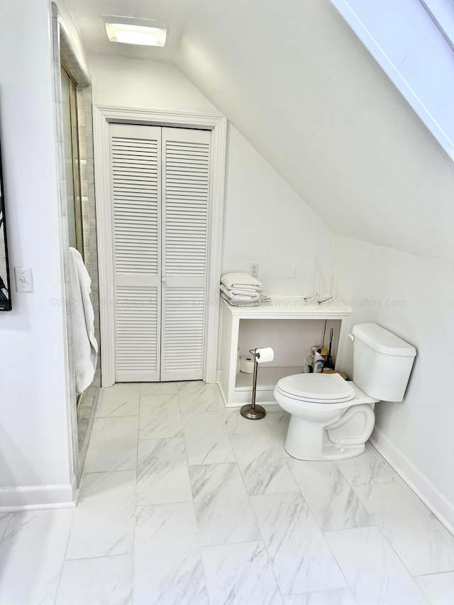 4963 Littleville Rd, Haleyville, AL 35565 - full bathroom featuring vaulted ceiling, marble finish floors, a shower stall, and a closet