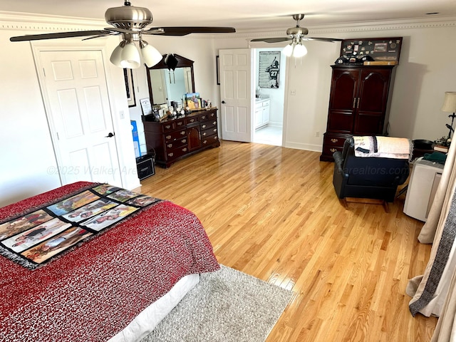 4963 Littleville Rd, Haleyville, AL 35565 - bedroom featuring light wood finished floors, ceiling fan, ensuite bath, and ornamental molding