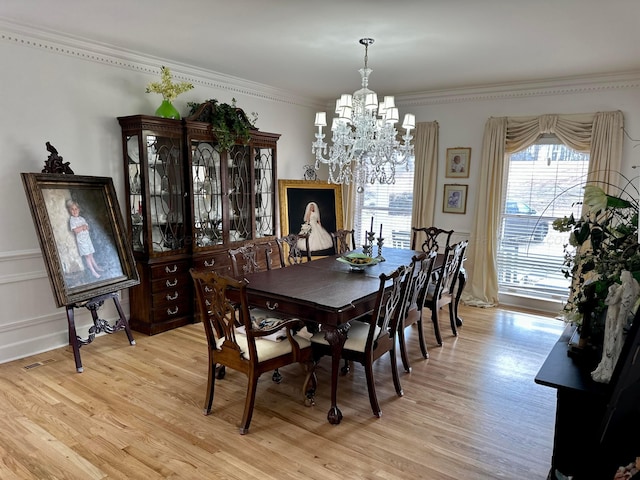 4963 Littleville Rd, Haleyville, AL 35565 - dining room with a chandelier, light wood-type flooring, and ornamental molding
