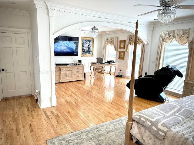 4963 Littleville Rd, Haleyville, AL 35565 - bedroom with arched walkways, crown molding, light wood-style floors, an office area, and ceiling fan