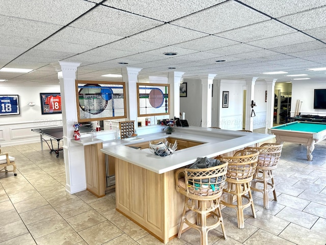 4963 Littleville Rd, Haleyville, AL 35565 - bar area featuring ornate columns, light tile patterned floors, billiards, and a decorative wall