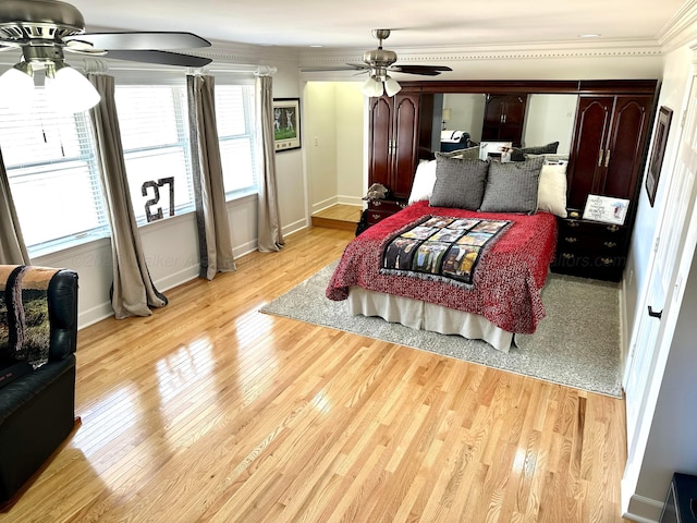4963 Littleville Rd, Haleyville, AL 35565 - bedroom featuring ornamental molding, light wood-style floors, and a ceiling fan