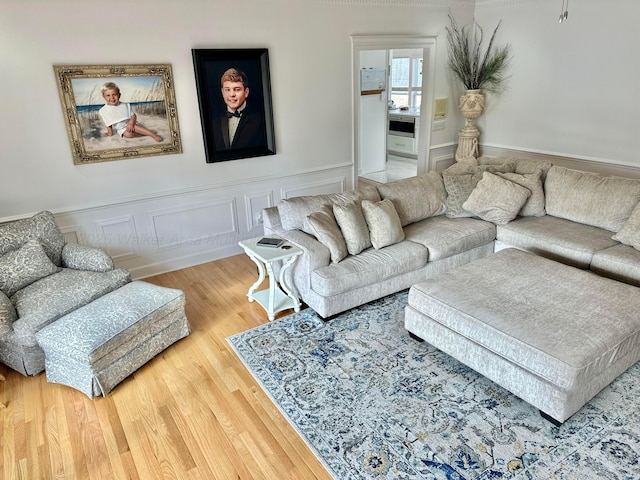 4963 Littleville Rd, Haleyville, AL 35565 - living area featuring wood finished floors and a wainscoted wall