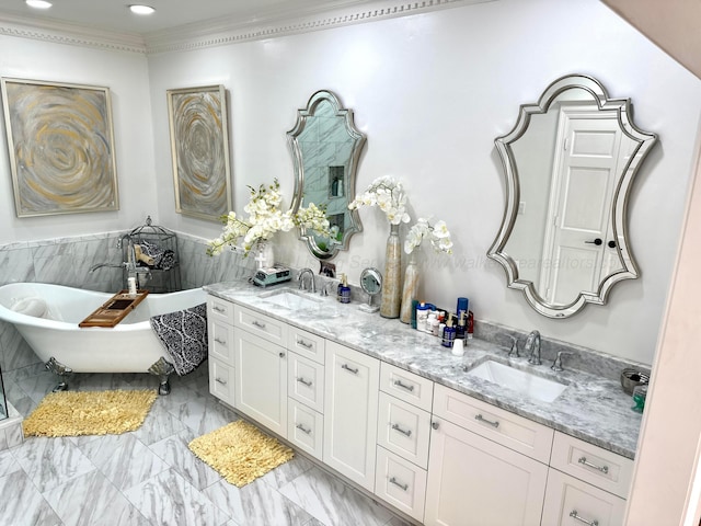 4963 Littleville Rd, Haleyville, AL 35565 - bathroom featuring double vanity, a freestanding bath, crown molding, marble finish floors, and recessed lighting