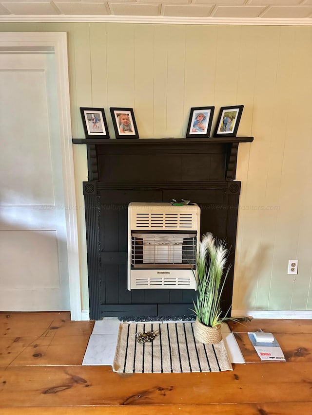1670 County Highway 47, Winfield, AL 35594 - details featuring heating unit, ornamental molding, and wood finished floors