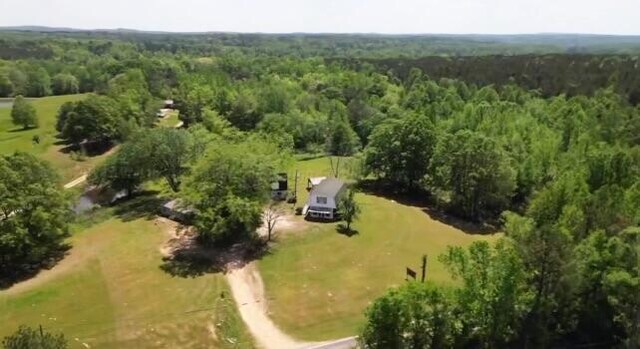 1670 County Highway 47, Winfield, AL 35594 - birds eye view of property with a wooded view and a rural view