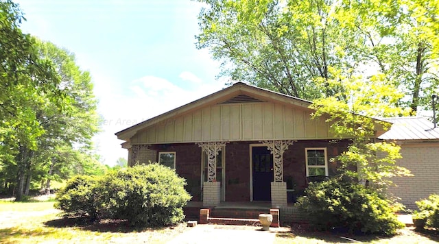 1670 County Highway 47, Winfield, AL 35594 - view of front of house with brick siding and a porch