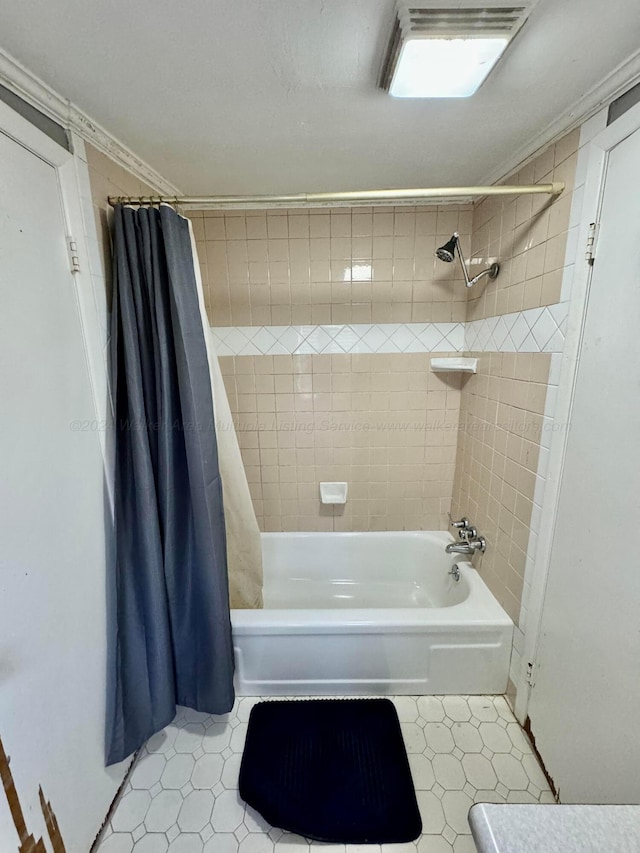 full bath featuring shower / bath combination with curtain