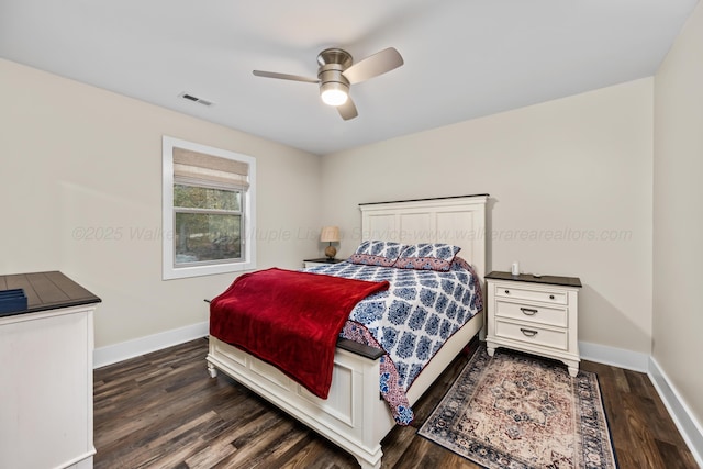 bedroom with dark wood-type flooring and ceiling fan