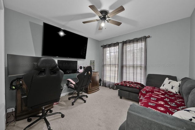 office area featuring carpet floors and ceiling fan