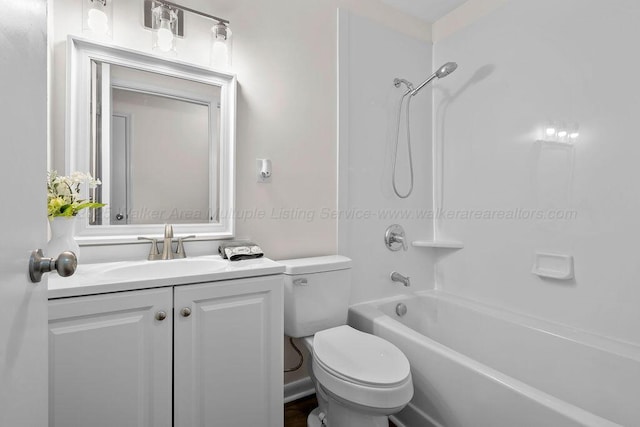 full bathroom with toilet, vanity, and tub / shower combination