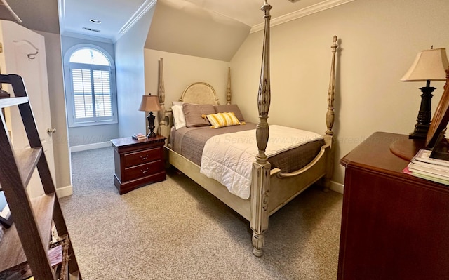 bedroom featuring crown molding, vaulted ceiling, and carpet