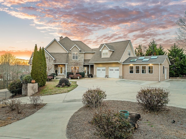 view of front of house featuring solar panels