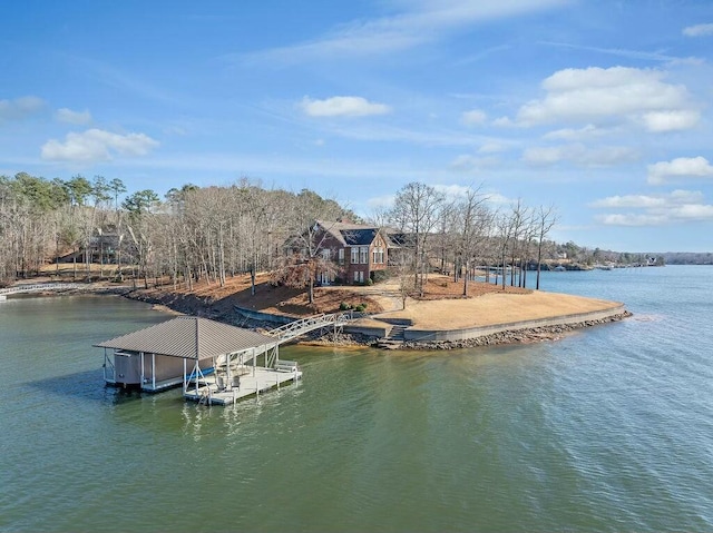 view of dock featuring a water view and boat lift