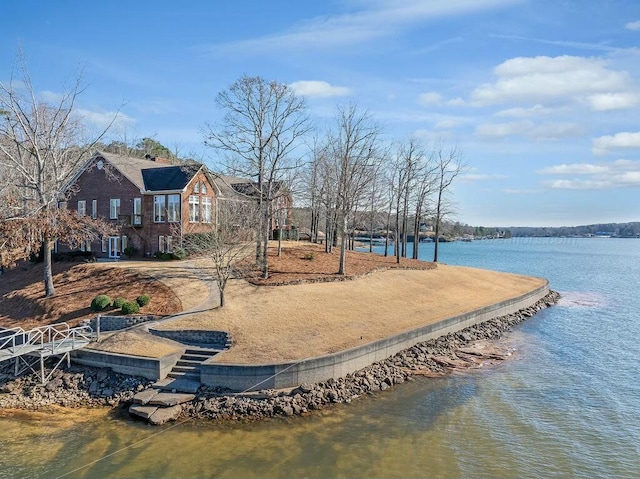 dock area with a water view