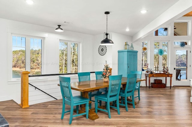 dining area featuring wood-type flooring