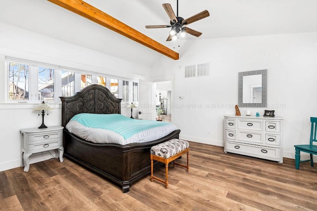 bedroom with ceiling fan, hardwood / wood-style floors, high vaulted ceiling, and beam ceiling