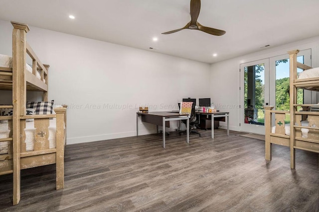 office space with ceiling fan, dark hardwood / wood-style flooring, and french doors