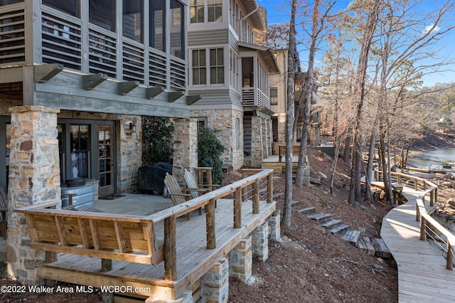 deck featuring a sunroom