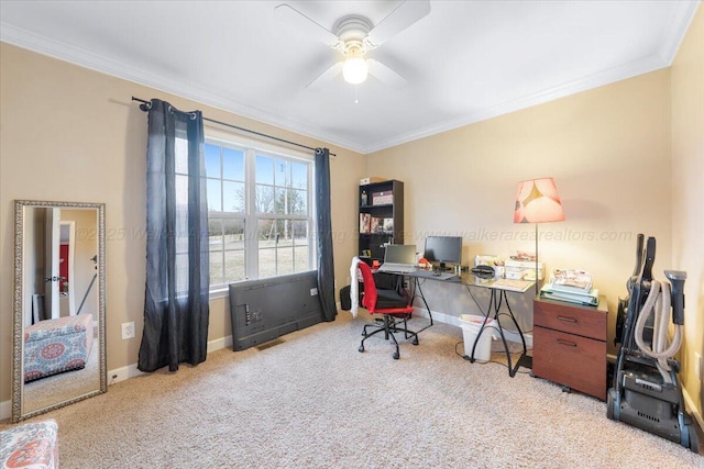 office area with carpet floors, baseboards, ornamental molding, and ceiling fan