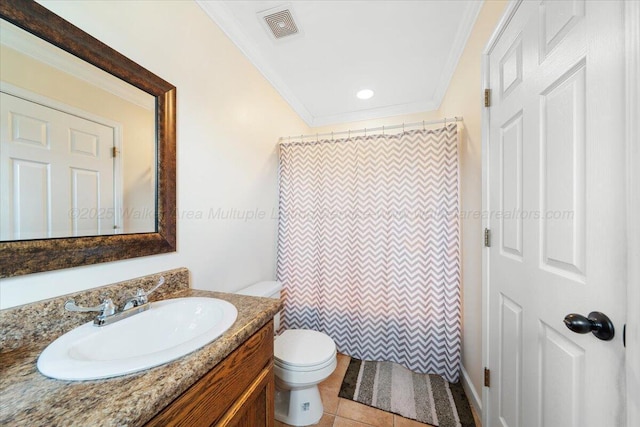 bathroom featuring visible vents, toilet, ornamental molding, vanity, and tile patterned floors