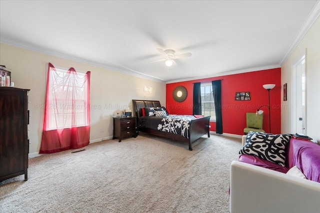 bedroom featuring ceiling fan, ornamental molding, carpet flooring, and baseboards