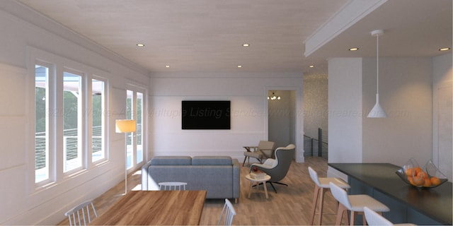 living room with recessed lighting, wood finished floors, and ornamental molding