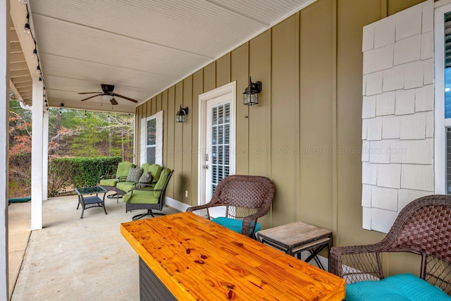 view of patio featuring ceiling fan