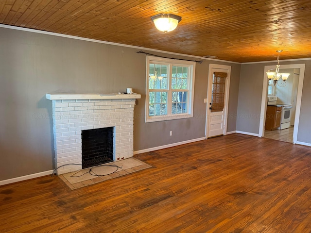 unfurnished living room featuring wood finished floors, an inviting chandelier, a fireplace, wood ceiling, and crown molding