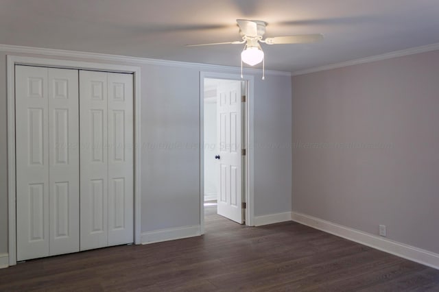 unfurnished bedroom with ceiling fan, dark hardwood / wood-style floors, and ornamental molding