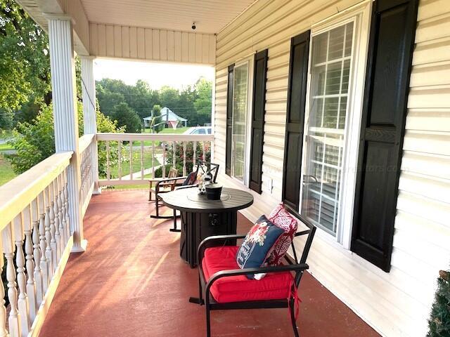 balcony featuring a porch