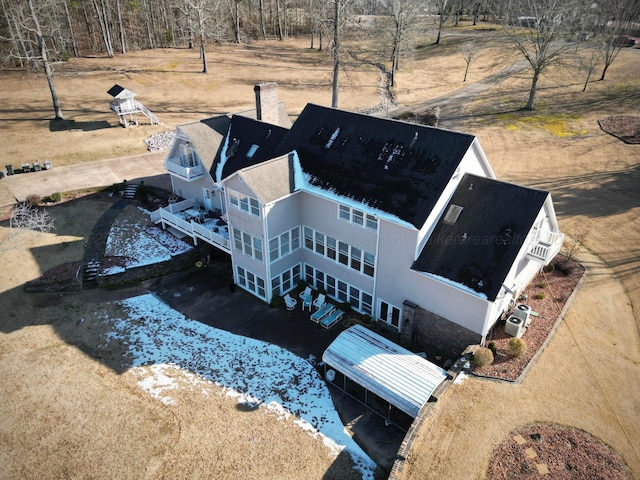 birds eye view of property with a rural view