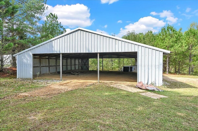 view of car parking with a yard