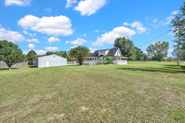 view of yard with an outdoor structure