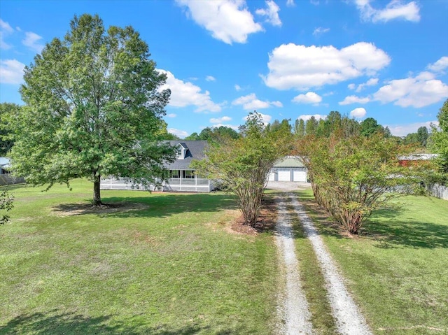 view of yard with a garage