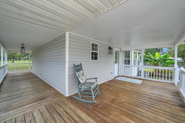 wooden deck featuring a porch