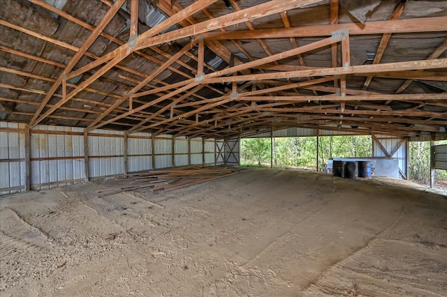 miscellaneous room with lofted ceiling