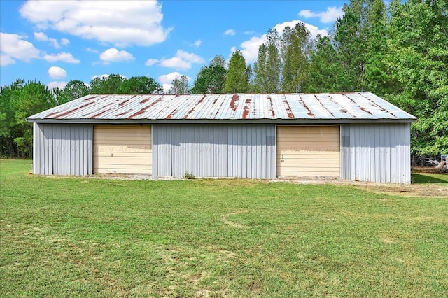 garage with a lawn