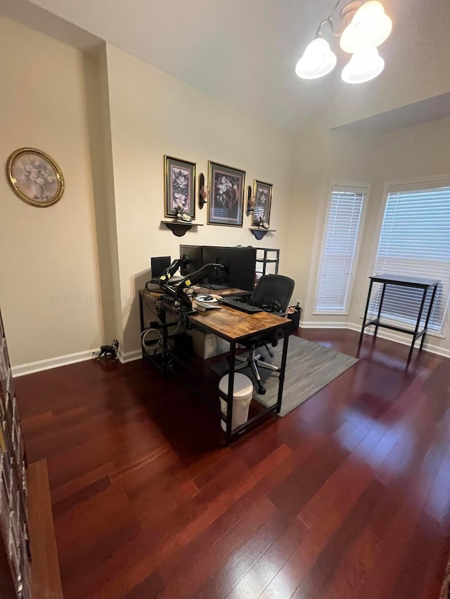 home office with wood-type flooring, baseboards, and a chandelier