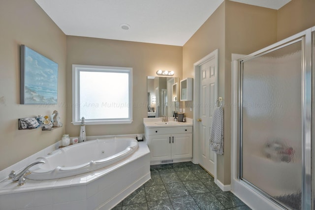 bathroom with plus walk in shower and vanity