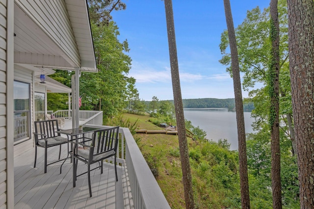 wooden terrace with a water view