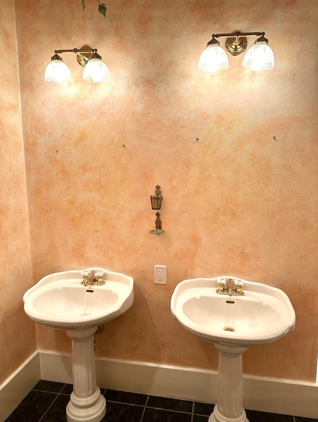 bathroom with tile patterned flooring