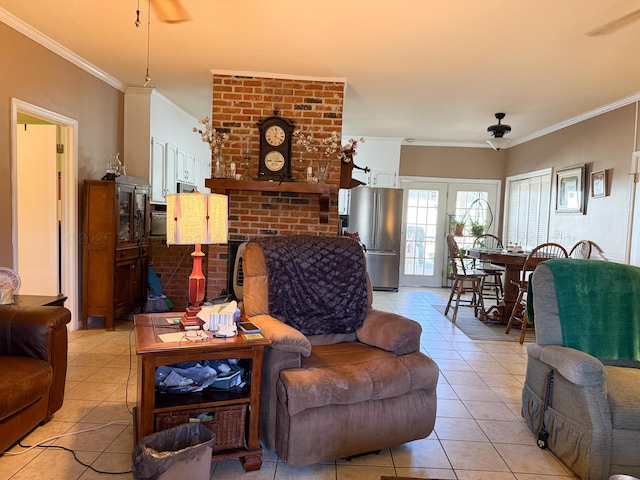 living area with light tile patterned flooring, crown molding, and a ceiling fan