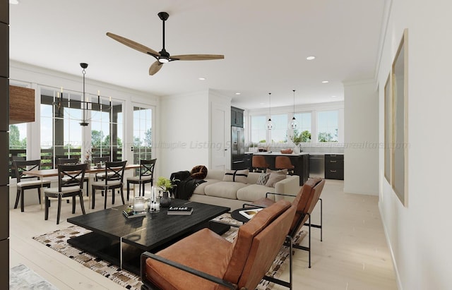 living room featuring crown molding, ceiling fan, plenty of natural light, and light hardwood / wood-style floors