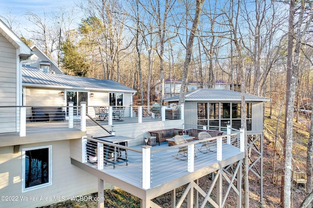 wooden deck with an outdoor hangout area