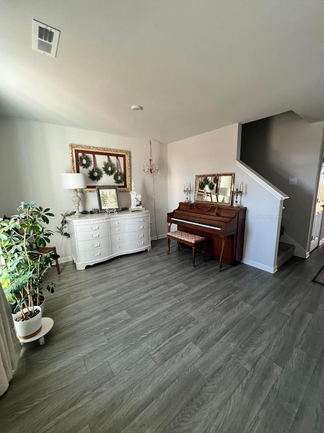 miscellaneous room with dark hardwood / wood-style floors