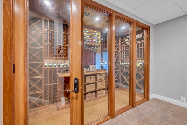 wine cellar with tile patterned flooring