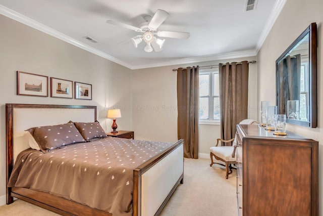 bedroom featuring ceiling fan, crown molding, and light carpet