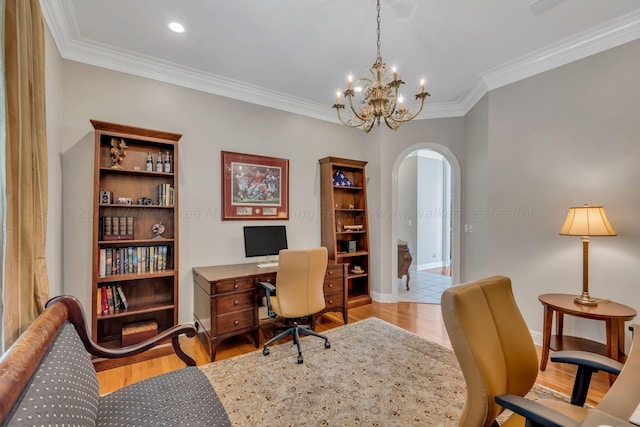 office with light hardwood / wood-style flooring, crown molding, and a notable chandelier