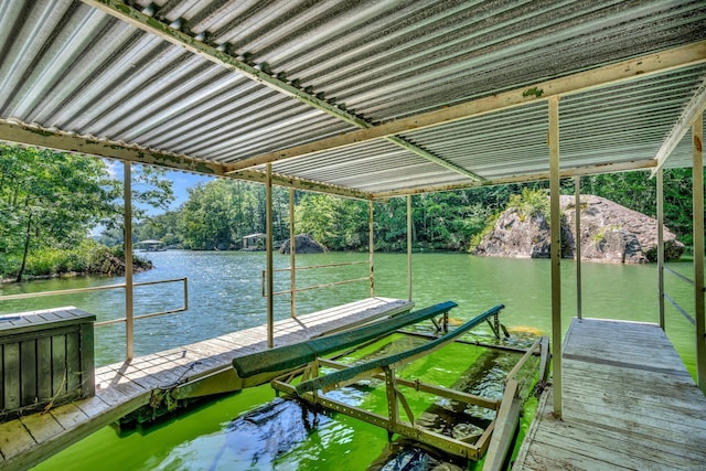 dock area featuring a water view and boat lift